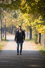 Man In Autumn Park