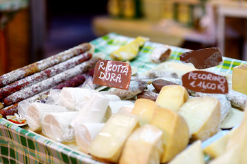 Naklejka na ściany i meble Selection of cheeses on typical italian farmer market