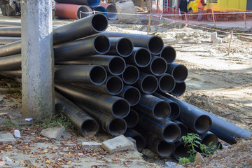 pile of pipe on the road