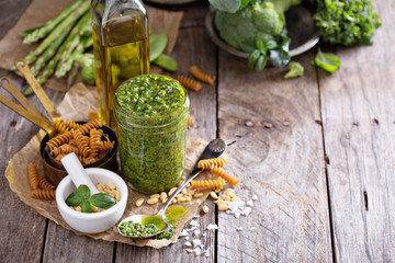 Jar with homemade pesto sauce 