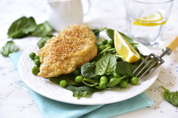 Roasted chicken breast in sesame crust.