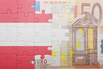 puzzle with the national flag of austria and euro banknote
