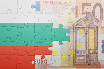 puzzle with the national flag of bulgaria and euro banknote