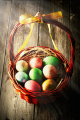 Colored easter eggs in basket