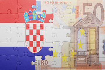 puzzle with the national flag of croatia and euro banknote