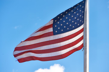Obraz premium US American flag waving in the wind