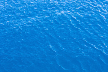 Blue sea surface with waves