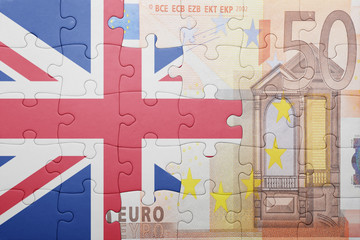 puzzle with the national flag of great britain and euro banknote