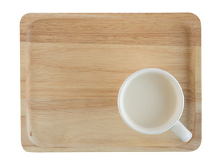 Cup of milk on the wooden tray isolated on white