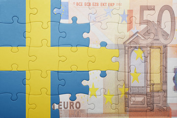 puzzle with the national flag of sweden and euro banknote