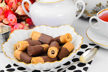 Delicious Cookies with Chocolate on Plate