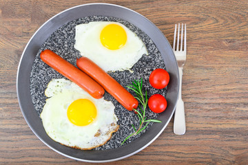 Fried Eggs with Fried Sausages.
