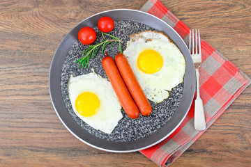 Fried Eggs with Fried Sausages.