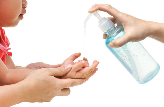 Applying cleaning gel on baby's hand