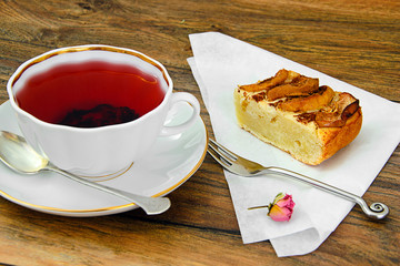 Apple Pie with Tea Cup on Woody Backfround.