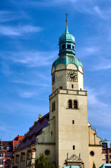 Fototapeta na wymiar Neo-Renaissance clock tower of the church in Poznan .