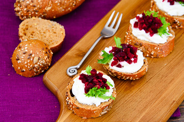 Bruschetta with Goat Cheese, Arugula and Beet, Salt, Pepper, Hon