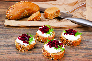 Bruschetta with Goat Cheese, Arugula and Beet, Salt, Pepper, Hon