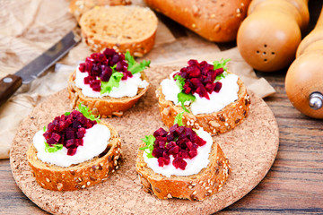 Bruschetta with Goat Cheese, Arugula and Beet, Salt, Pepper, Hon