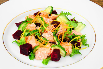 Salad with Beets, Salmon, Cucumber, Arugula, Lemon Zest, Orange,