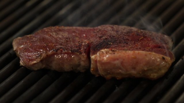 Grilled steak on gas grill 