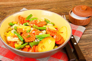 Steamed vegetables potatoes, carrots, corn, green beans, onion