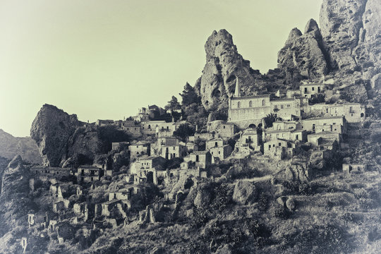Italian town Pentedattilo with special effect - old photo