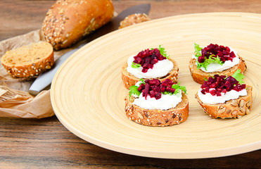 Bruschetta with Goat Cheese, Arugula and Beet, Salt, Pepper, Hon
