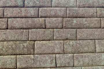 Detail of perfect Inca stonework of Temple of the Sun at Machu Picchu ruins, Peru