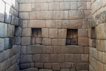 Perfect Inca stonework of Temple of the Sun at Machu Picchu ruins, Peru