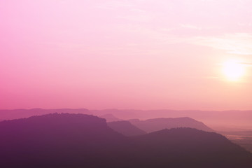 The morning sun rising over the mountains