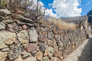 One of ancient alleys of Ollantaytambo village, Sacred Valley of Incas, Peru