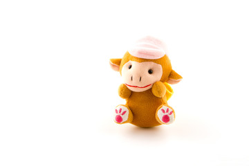 a cute cow doll isolated on white background.