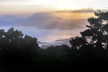 Silhouette of Sunrise and mist with mountain at Huai Nam Dang National Park in Chiang Mai and Mae Hong Son, Thailand.