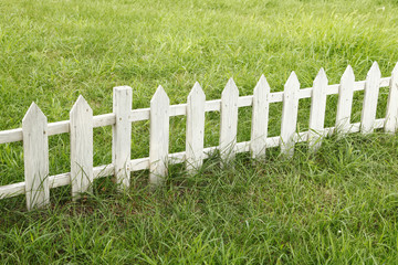 The lawn wooden fence