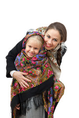 A young woman with little girl in Russian kerchiefs