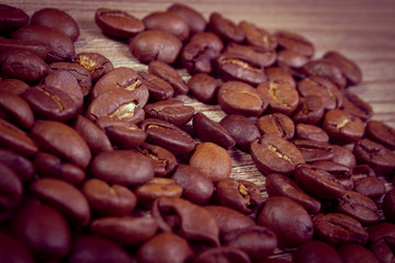 Vintage photo, Heap of coffee on wooden background