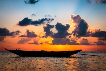 Fisherman boat with sunset scene in koh phangan.