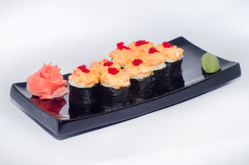 hot baked sushi rolls with wasabi and ginger cheese with red caviar