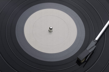Vinyl Record with Tone Arm and label with copy space.