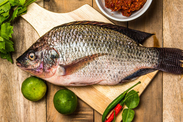 Fresh raw fish on the wood