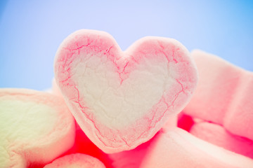 Fototapeta premium Pink heart shape of marshmallow with filter effect retro vintage