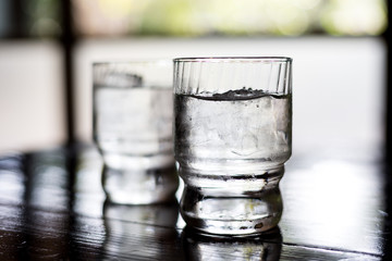 Glass of water on table in restaurant