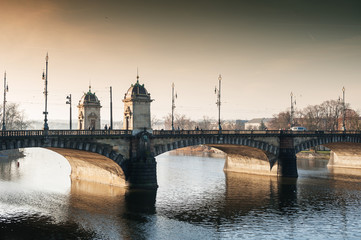 Legion Bridge on Vltava river at morning sunlight.