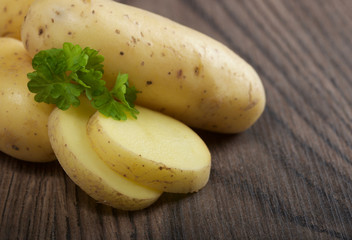 potatoes on a wooden background