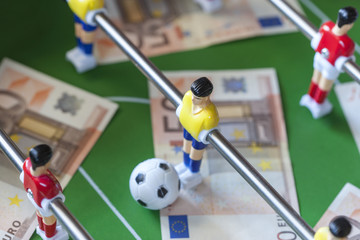 Fototapeta premium Sports and money. Concept about money spending in football (soccer), sports betting and manipulated fixed matches