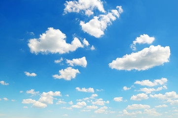 Naklejka na ściany i meble cumulus clouds in the blue sky