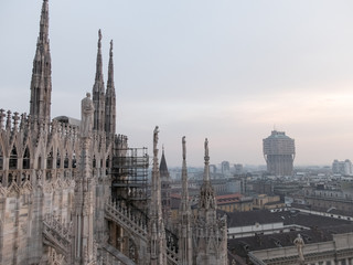 Fototapeta premium Hazy Cityscape seen from Milan Cathedral