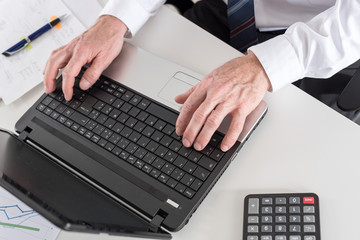 Businessman working on his laptop