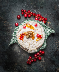 Camembert cheese and berries , top view